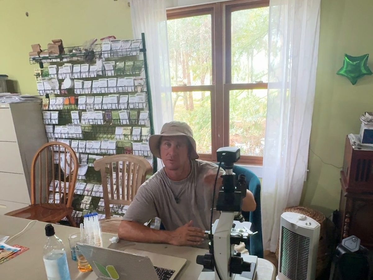 Jake Friesz at his microscope